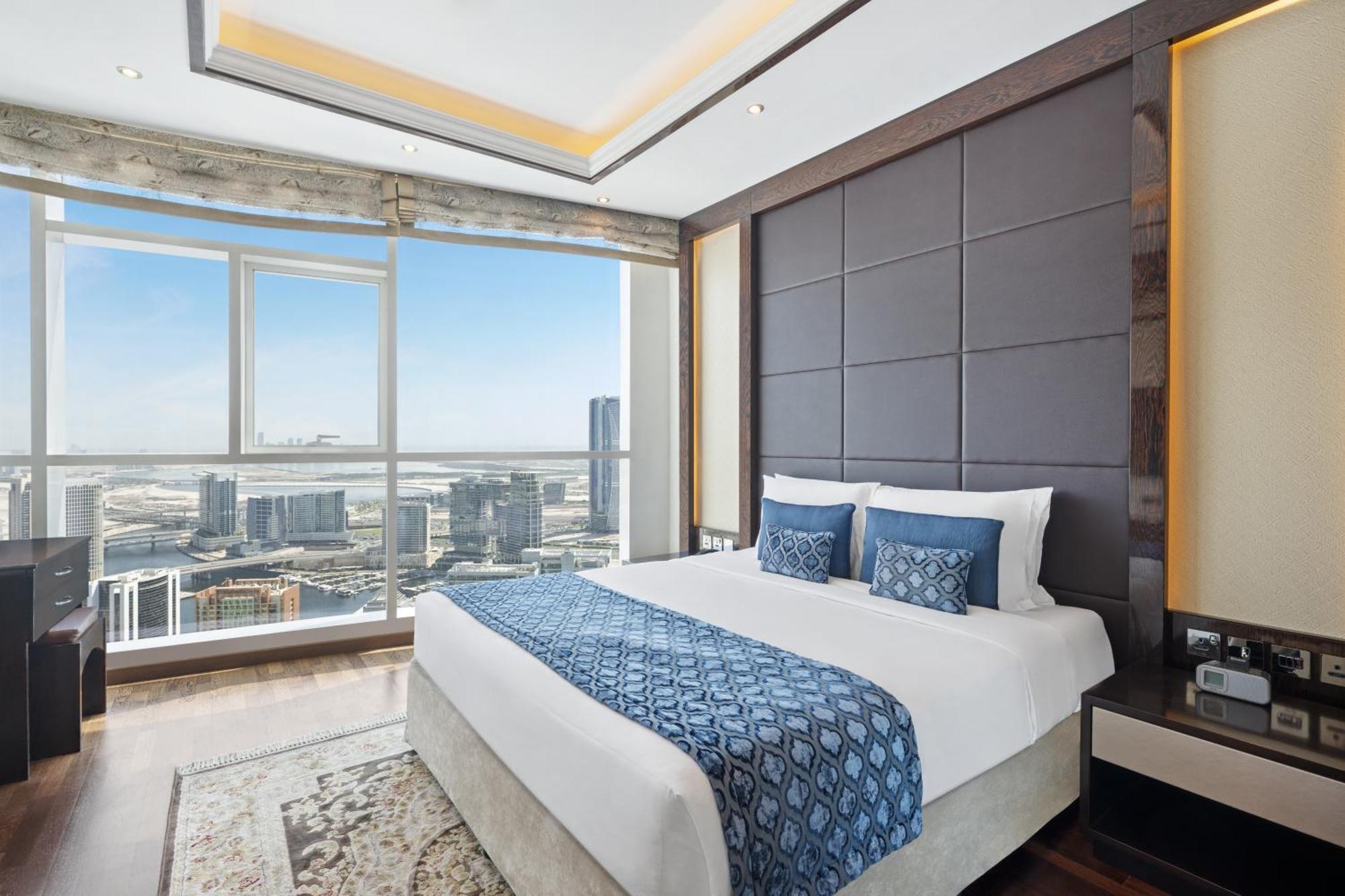 Damac Maison Distinction Dubai Exterior foto A bedroom at the hotel
